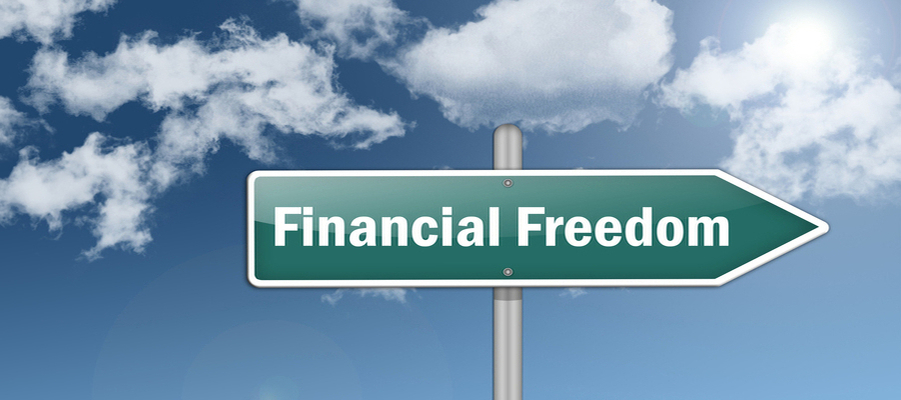 The Team Phoenix Transformation image of a green arrown with the text financial freedom and the backdrop of a blue sky with clouds